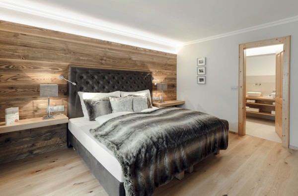 Schlafzimmer in der Alpine Suite im Hotel Montanara © Beni Mooslechner